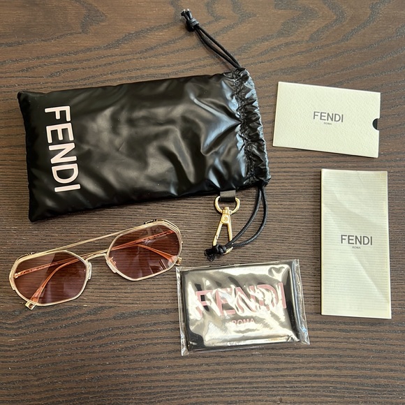 Fendi Hexagonal O’Lock sunglasses. Gold frame and Pink/Purple Lense - Picture 6 of 9